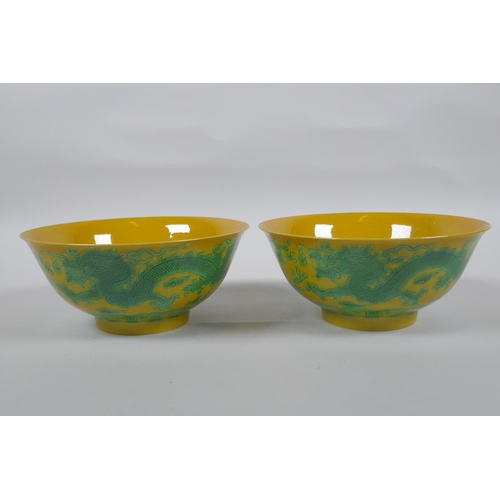 120 - A pair of yellow ground porcelain bowls with incised and green glazed dragon decoration, Chinese3 Ka... 