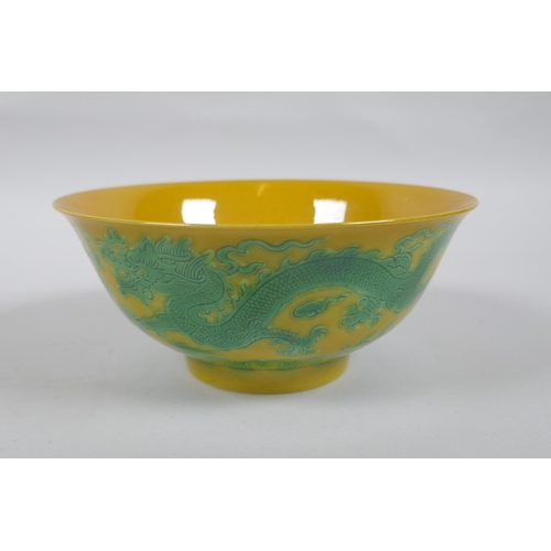 120 - A pair of yellow ground porcelain bowls with incised and green glazed dragon decoration, Chinese3 Ka... 