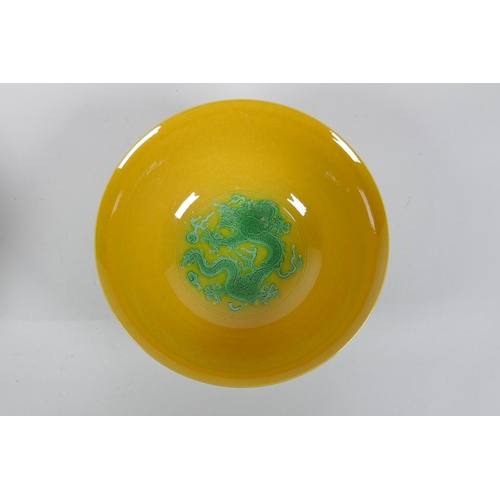 120 - A pair of yellow ground porcelain bowls with incised and green glazed dragon decoration, Chinese3 Ka... 