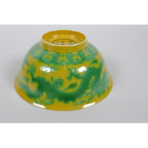 120 - A pair of yellow ground porcelain bowls with incised and green glazed dragon decoration, Chinese3 Ka... 