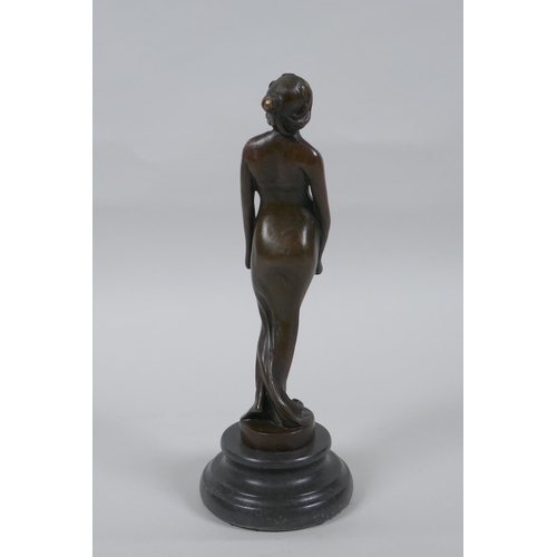 127 - An Art Nouveau style bronze figure of a semi clad woman, 19cm high