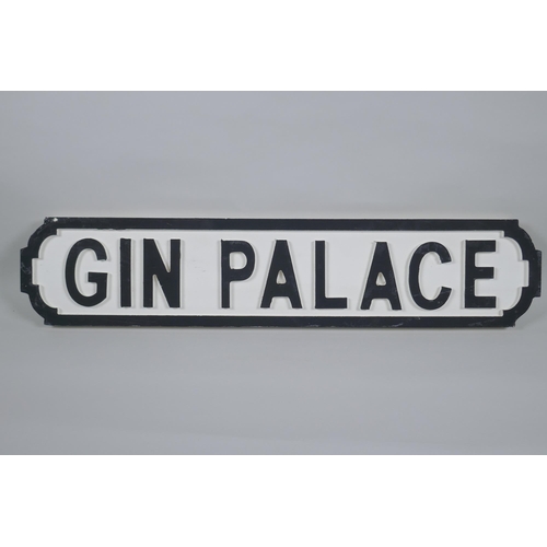 131 - A painted wood 'Gin Palace' road sign, 14 x 65cm long