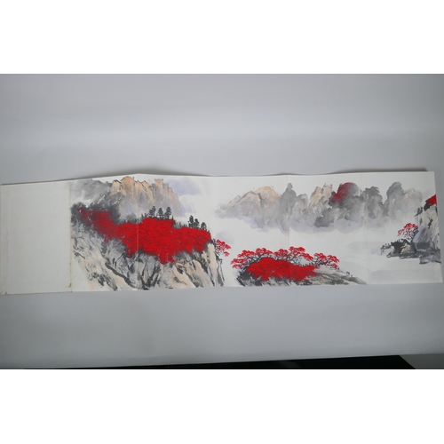 133 - A Chinese watercolour concertina book depicting a mountain river scene, 17 x 25cm