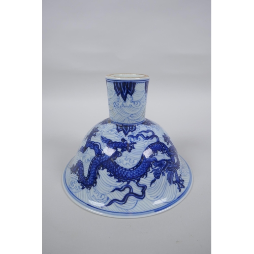 141 - A blue and white porcelain stem bowl decorated with twin dragons, Chinese Xuande 6 character mark to... 