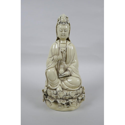 148 - A Chinese blanc de chine porcelain Quan Yin, impressed marks verso, 26cm high