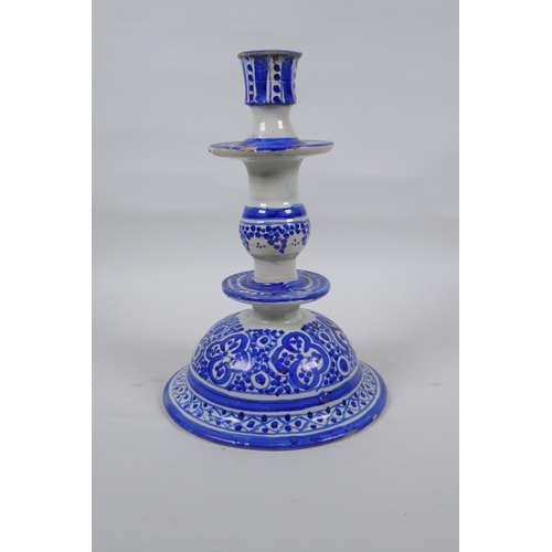 150 - A blue and white tin glazed ceramic hookah base/candlestick, 25cm high