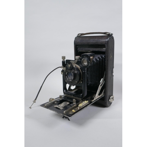 156 - Three early C20th medium and large format cameras including a Kodak No.3A Autographic, a Houghton En... 