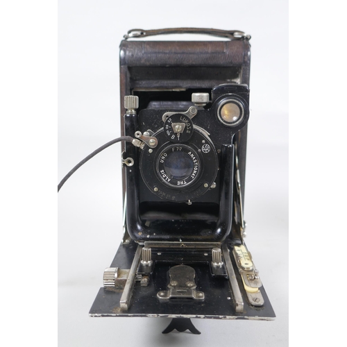 156 - Three early C20th medium and large format cameras including a Kodak No.3A Autographic, a Houghton En... 