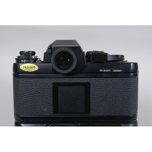 157 - A Nikon F3 SLR camera, Serial No 1265547, fitted with a Zoom Nikkor 25-50mm F:4 lens and a Nikon MD-... 