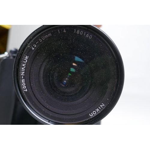 157 - A Nikon F3 SLR camera, Serial No 1265547, fitted with a Zoom Nikkor 25-50mm F:4 lens and a Nikon MD-... 