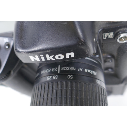 158 - A Nikon F5 Kodak Professional DCS 620 digital camera, fitted with an AF Nikkor 28-80mm lens, camera ... 