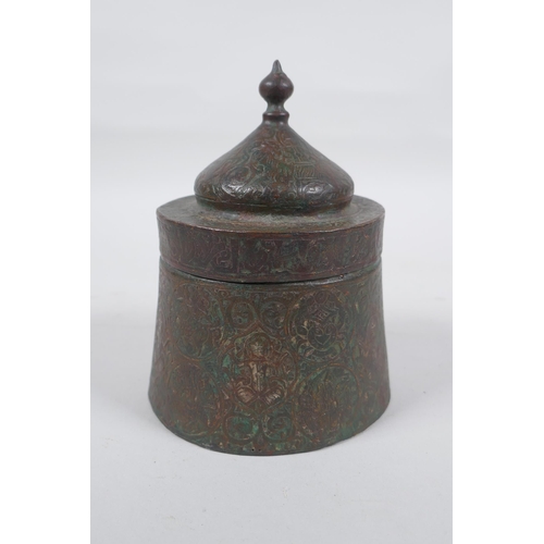 163 - An antique Persian copper ink well with remnants of multi metal inlaid decoration, possibly Khorassa... 