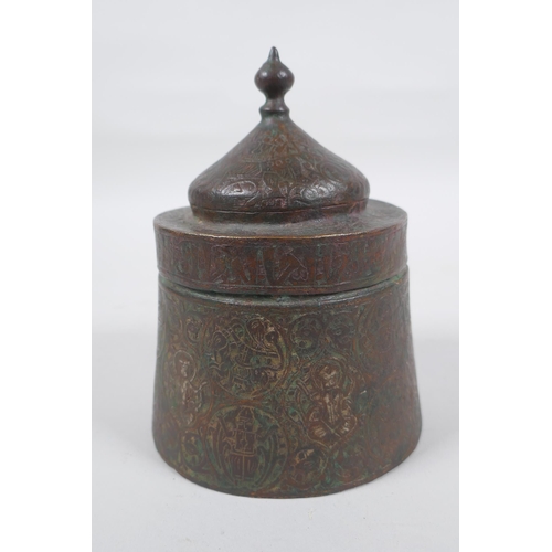 163 - An antique Persian copper ink well with remnants of multi metal inlaid decoration, possibly Khorassa... 