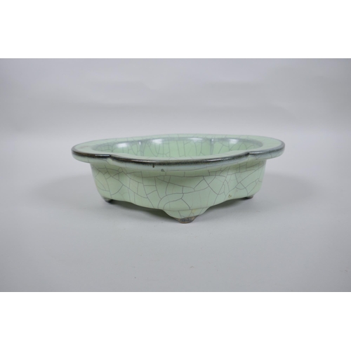 169 - A Chinese celadon Ge ware planter of lobed form, 23 x 18cm, seal mark to base