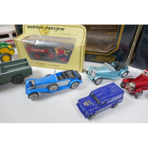 177 - A Bburago 1/18 scale die cast Mercedes Benz SSK (1928) and a Jaguar E. Cabriolet (1961), both in ori... 