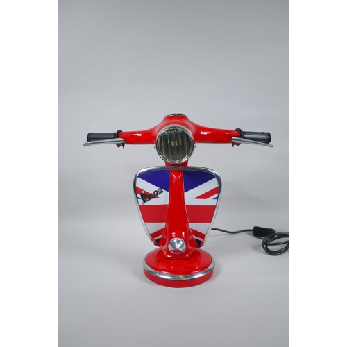 181 - A painted metal table lamp in the form of a Vespa's handlebars, 33cm high