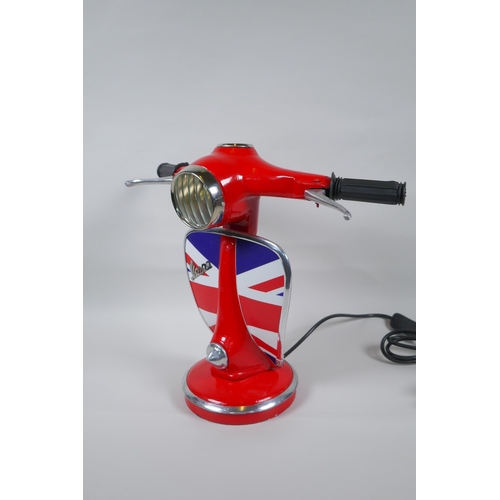 181 - A painted metal table lamp in the form of a Vespa's handlebars, 33cm high