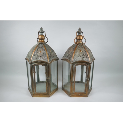 182 - A pair of coppered metal hexagonal lanterns, 49cm high