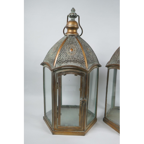 182 - A pair of coppered metal hexagonal lanterns, 49cm high