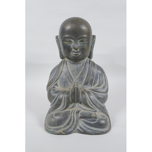 189 - A Sino Tibetan bronze figure of Buddha, 28cm high