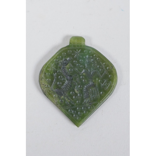 197 - An Eastern spinach jade pendant with chased Islamic script decoration, and another decorated with a ... 