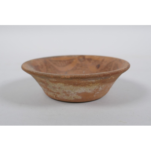 205 - A Moorish terracotta bowl, 9.5cm diameter