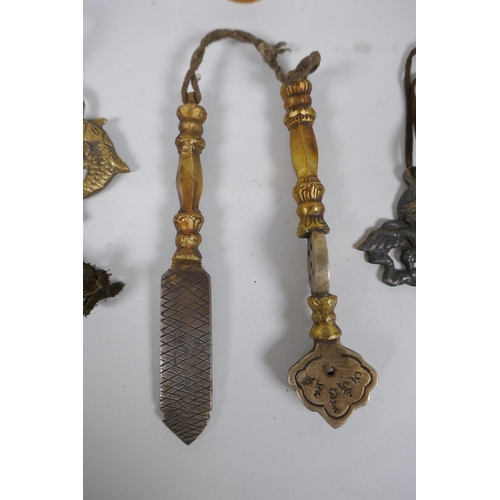 208 - Two Tibetan brass medical instruments/tools, together with a Sino Tibetan bronze Buddha and two bras... 