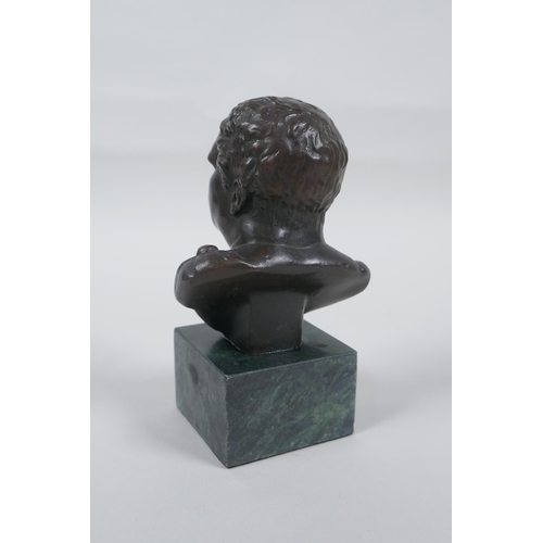 210 - A Greco-Roman style bronze bust, 14cm high