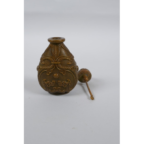 214 - A Chinese bronze snuff bottle with twin dragon decoration, 4 character mark to base, 9cm high