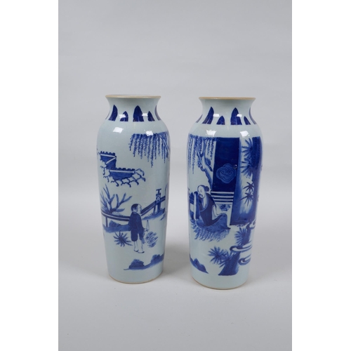 223 - A pair of Chinese blue and white porcelain vases decorated with figures in a garden, 23cm high