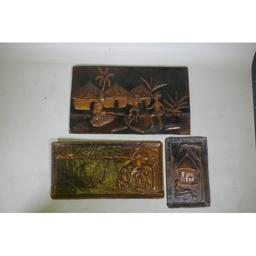 224 - Three African embossed copper decorative panels depicting figures in landscapes, two signed 'Kanbuvu... 