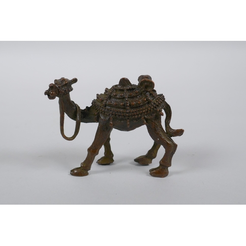 230 - An oriental bronze camel, 7cm high