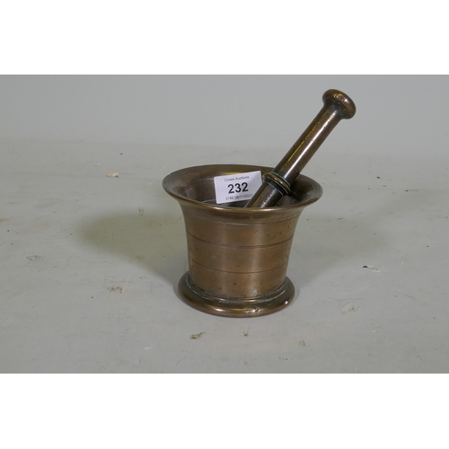 232 - An C18th bronze mortar and pestle, 9cm high