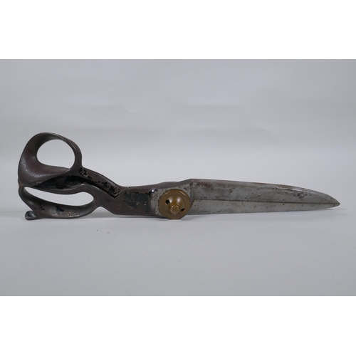 24 - A pair of US made tailor's shears by R. Heinisch of Newark, New Jersey, in steel with brass cap, 38c... 