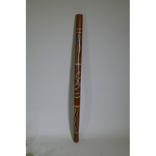 248 - An Australian carved and painted wood digeridoo, 122cm long