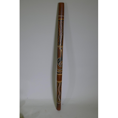 248 - An Australian carved and painted wood digeridoo, 122cm long