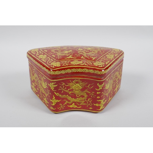 249 - A Chinese coral red ground porcelain box and cover with yellow dragon decoration, JiaJing 6 characte... 