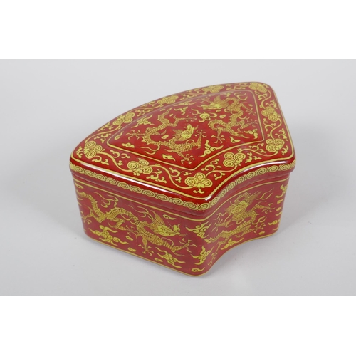 249 - A Chinese coral red ground porcelain box and cover with yellow dragon decoration, JiaJing 6 characte... 