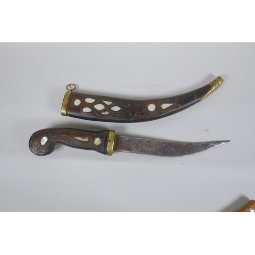 252 - A Turkish dagger Jambiya, with mother of pearl inlaid wood handle and sheath, and brass mounts, toge... 