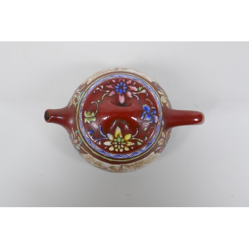 254 - A Chinese YiXing teapot of squat form with polychrome enamel decoration, impressed mark to base, 10c... 