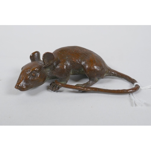 257 - A Japanese style bronze okimono rat, 8cm long