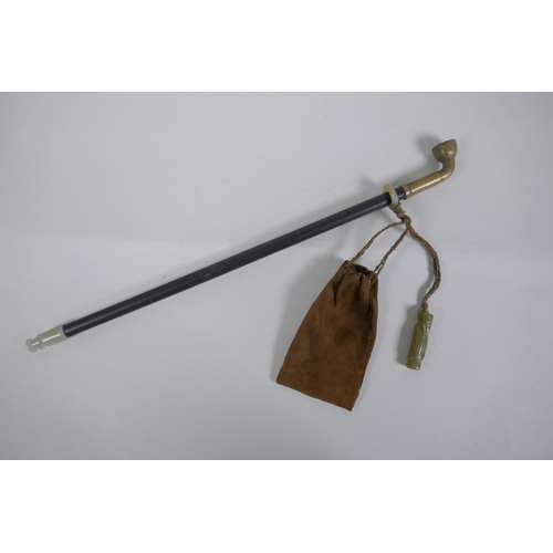 262 - A Chinese tobacco pipe and pouch, the hardwood pipe with jade and metal mounts, 39cm long