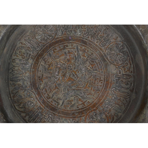 268 - An antique Persian copper dish with bamboo style border and multi metal inlaid decoration, possibly ... 