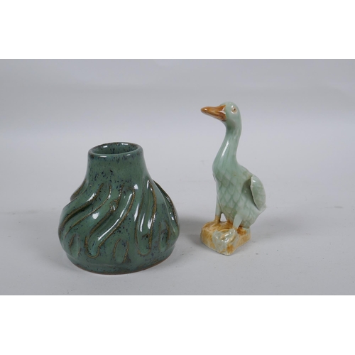 279 - An oriental celadon flambe glazed pottery water pot, and a Chinese celadon glazed duck, 11cm high