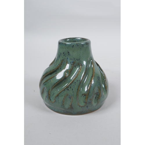 279 - An oriental celadon flambe glazed pottery water pot, and a Chinese celadon glazed duck, 11cm high