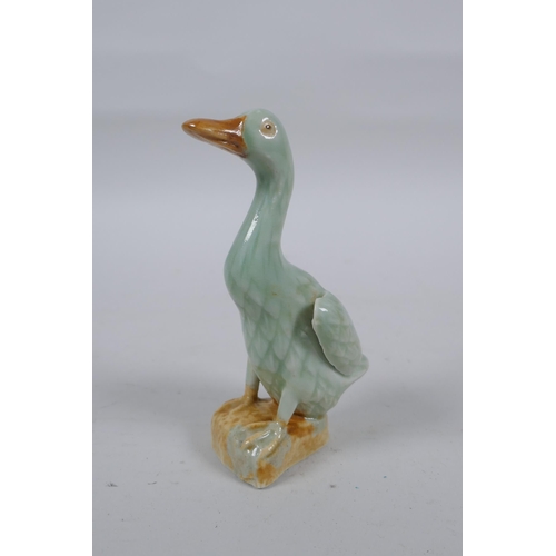 279 - An oriental celadon flambe glazed pottery water pot, and a Chinese celadon glazed duck, 11cm high