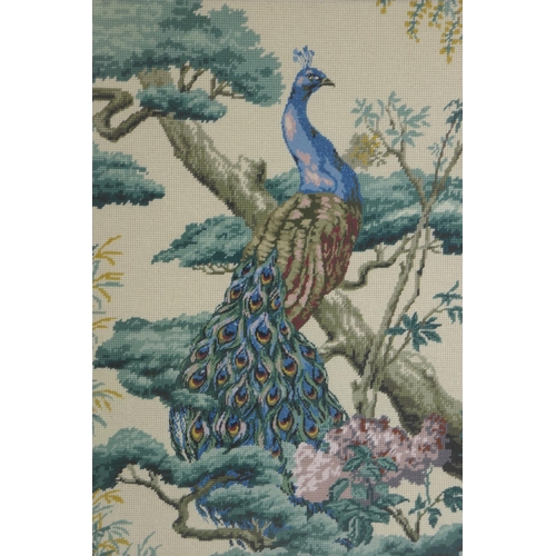 280 - An antique wool work depicting a peacock, and another depicting a couple harvesting flowers, largest... 