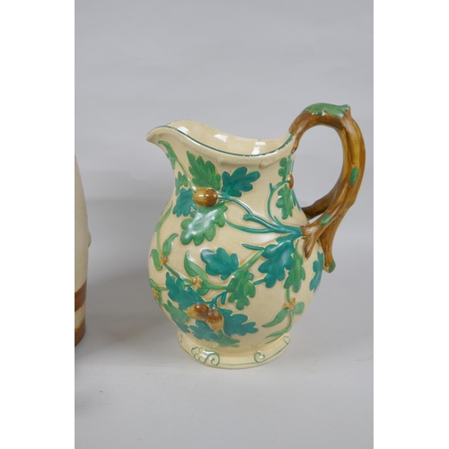 281 - A Mason's Ironstone hand painted pitcher with oak decoration, 24cm high, and an antique stoneware ke... 