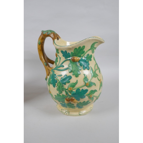 281 - A Mason's Ironstone hand painted pitcher with oak decoration, 24cm high, and an antique stoneware ke... 