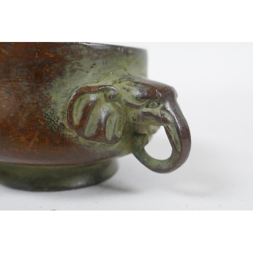 293 - A miniature Chinese bronze censer with two elephant mask handles, and another with lion mask handles... 